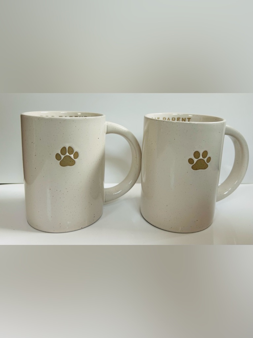 NEW!! Embossed “Dog” And “Cat” Parent Stoneware Mug Set With Paw Motif -(NWT)